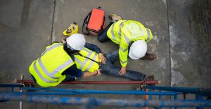 Basic first aid training for support accident in site work, Builder accident fall scaffolding to the floor, Safety team help employee accident.